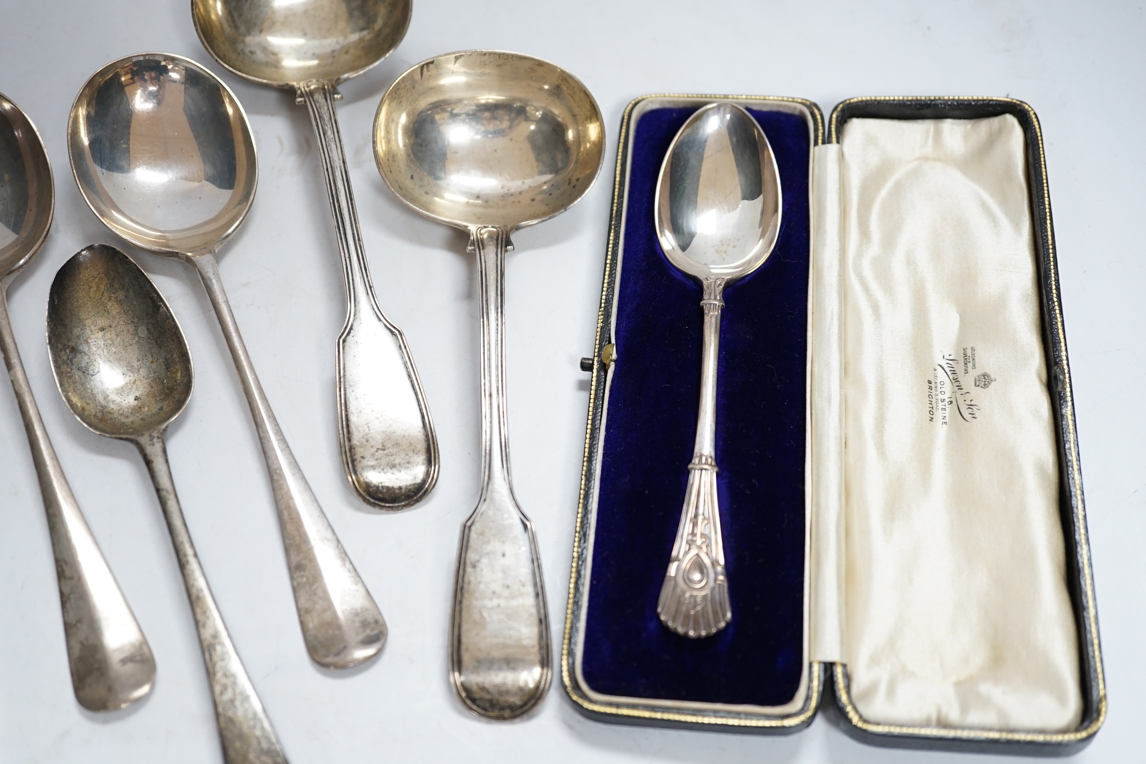 A small group of assorted silver flatware, including pair of fiddle and thread pattern sauce ladles, Elizabeth Eaton, London, 1848